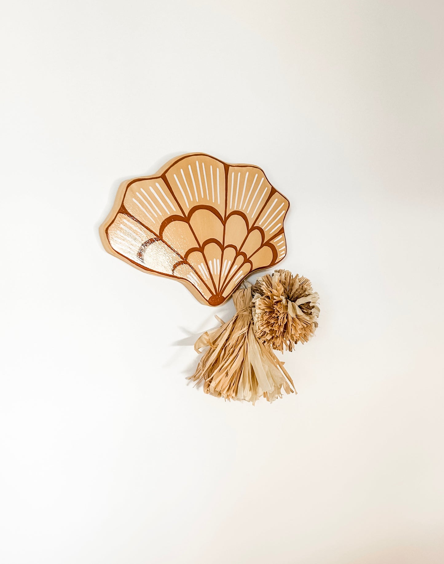 For lovers of neutrals, desert tones, modern boho bohemian vibe decor palm trees beautiful details raffia pompom and tassel decoration. Sea shell wall hanging. seashell wall tile. 
Decor for your holiday home, beach house, dream home, Airbnb property, Coastal Home, beach house, vacation property.