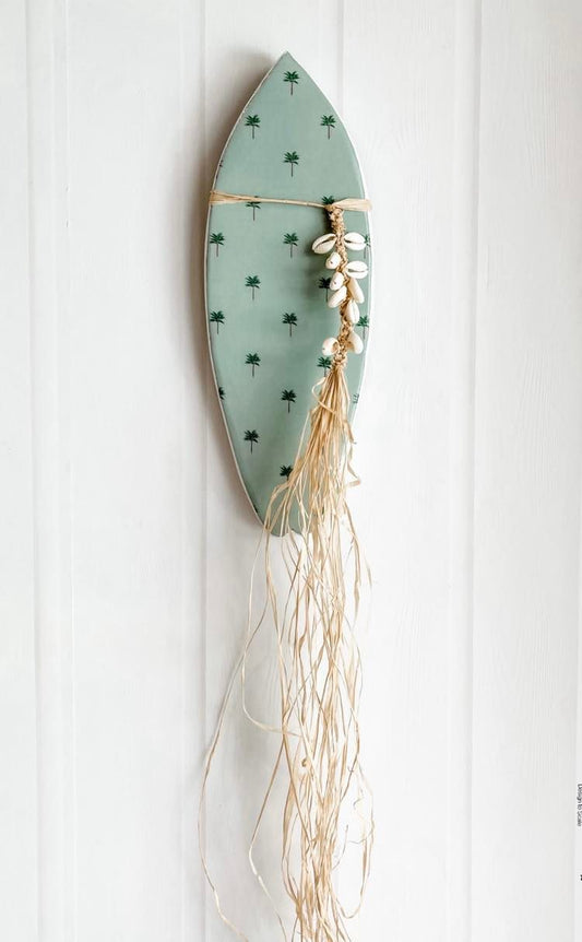 Surfboard wall hanging, surfie wall art . For lovers of sage, desert tones, modern boho bohemian vibe decor palm trees beautiful details raffia pompom and tassel decoration. Sea shell wall hanging. seashell wall tile. 
Decor for your holiday home, beach house, dream home, Airbnb property, Coastal Home, beach house, vacation property.